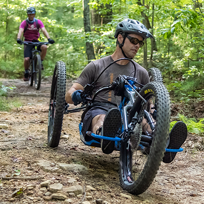 People on bikes in the NC forest